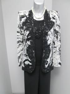 Veste en dentelle et paillettes 349 € du 38 au 56 : top 119 €